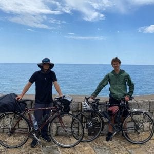 Liam and his friend posing for a photo during the bike trip
