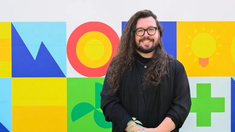 Faculty member Lucas Olscamp as the Climate Change Challenge winner